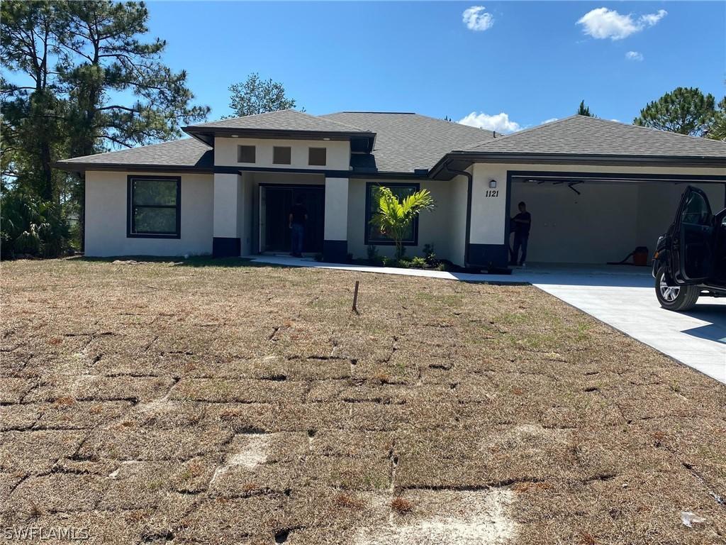 1121 Acacia Ave., Lehigh Acres, FL 33972