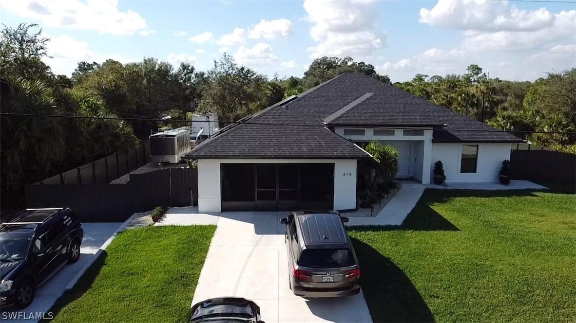 415 Plumosa Ave., Lehigh Acres, FL 33972