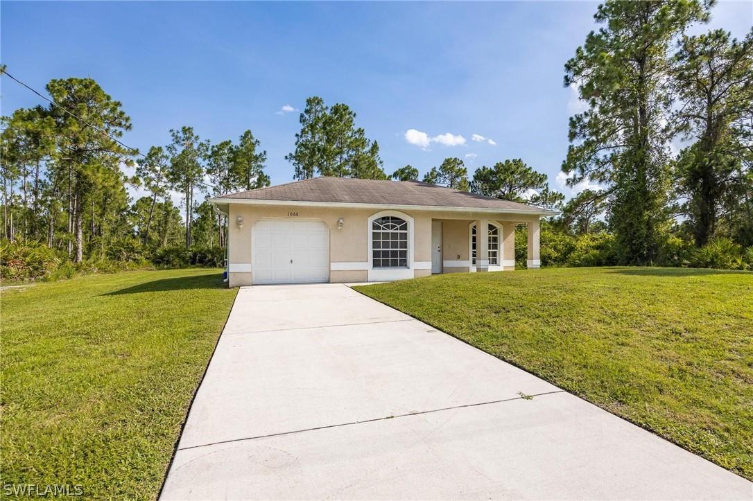 1066 Barnett St., Lehigh Acres, FL 33974