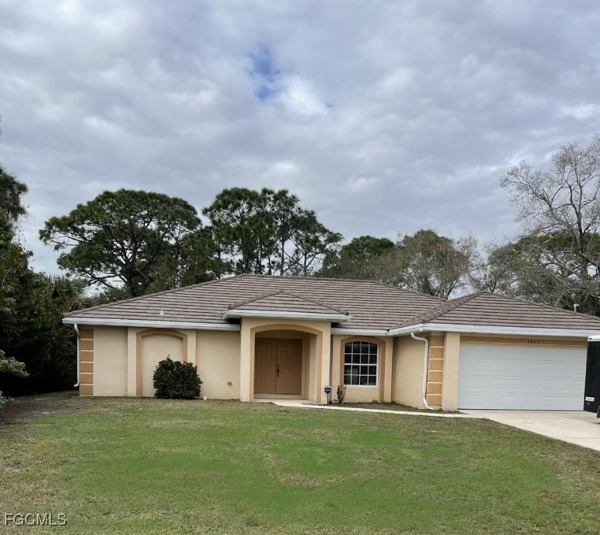 1825 Tomaso Ave., Lehigh Acres, FL 33972