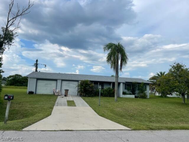 201 E Jasmine Rd., Lehigh Acres, FL 33936