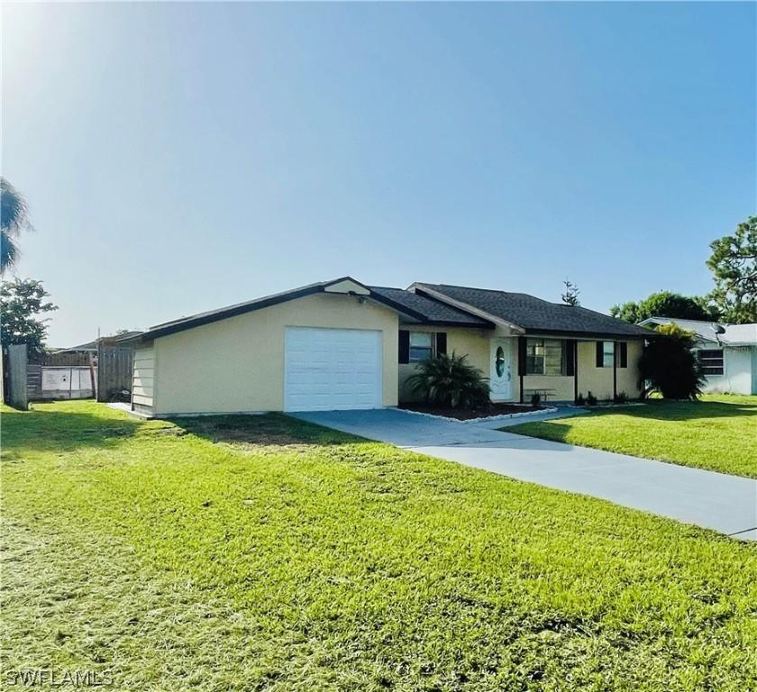 406 Cactus Cir., Lehigh Acres, FL 33936