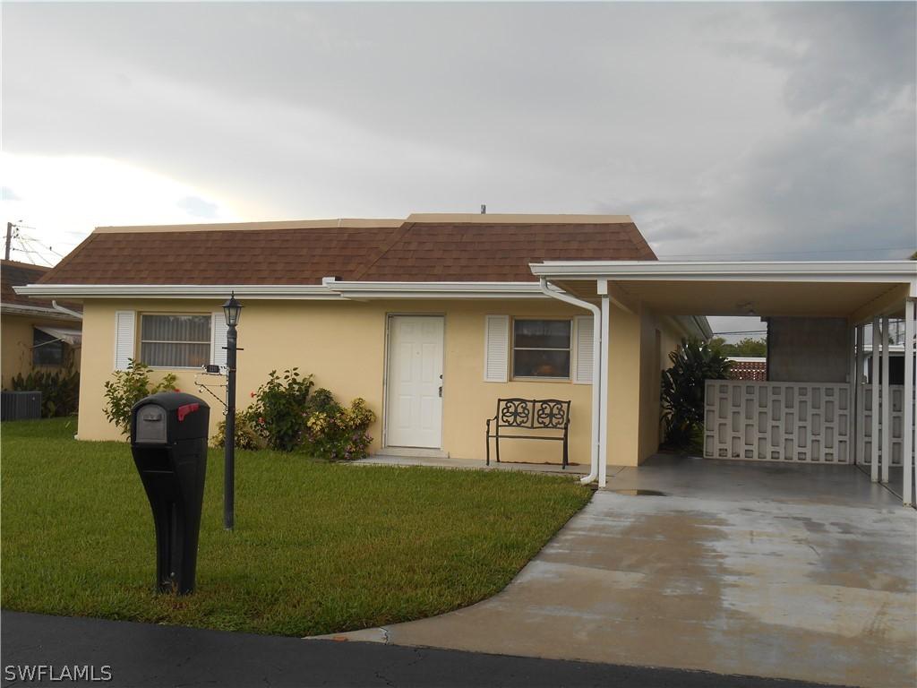 2211 Gardenia Way, Lehigh Acres, FL 33936
