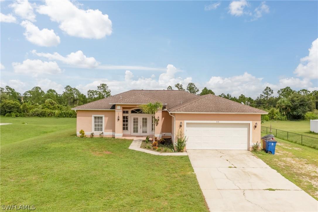 818 Cortez Ave., Lehigh Acres, FL 33972