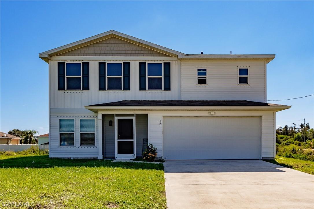391 Palora Ave., Lehigh Acres, FL 33974