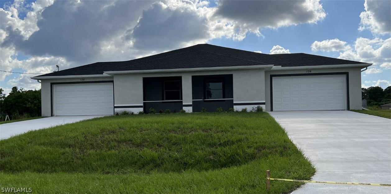 113-115 Gilbert Ave., Lehigh Acres, FL 33973