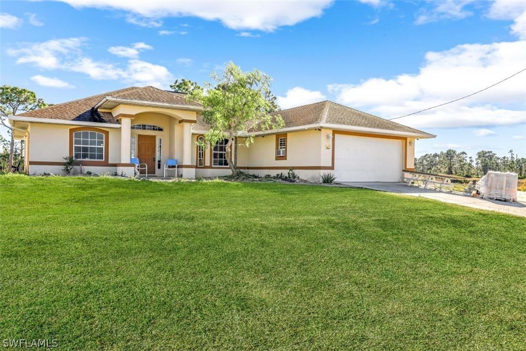 1025 Mark Ave., Lehigh Acres, FL 33974