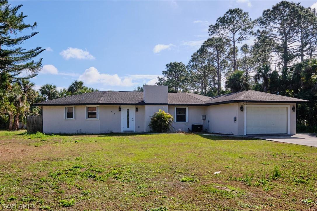 618 Cortez Ave., Lehigh Acres, FL 33972