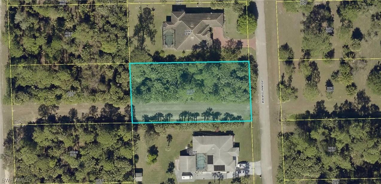 411 Poinsettia Ave., Lehigh Acres, FL 33972