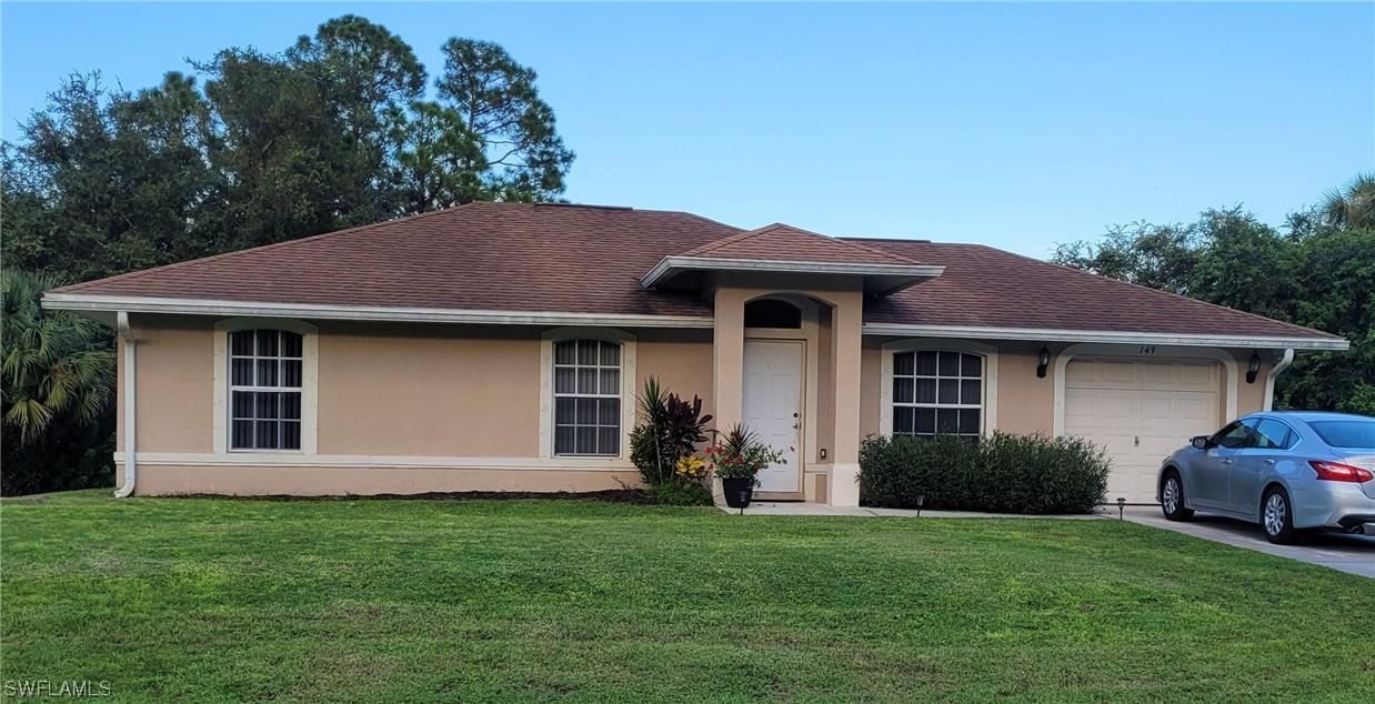 149 Mcarthur Blvd., Lehigh Acres, FL 33974