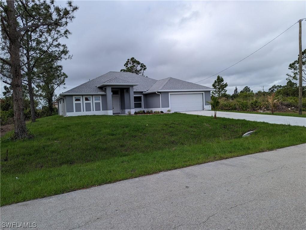 421 Cortez Ave., Lehigh Acres, FL 33972