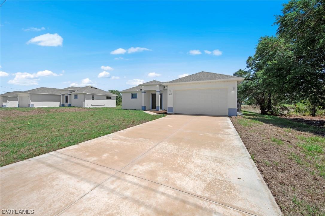 371 Ranier Ave., Lehigh Acres, FL 33974