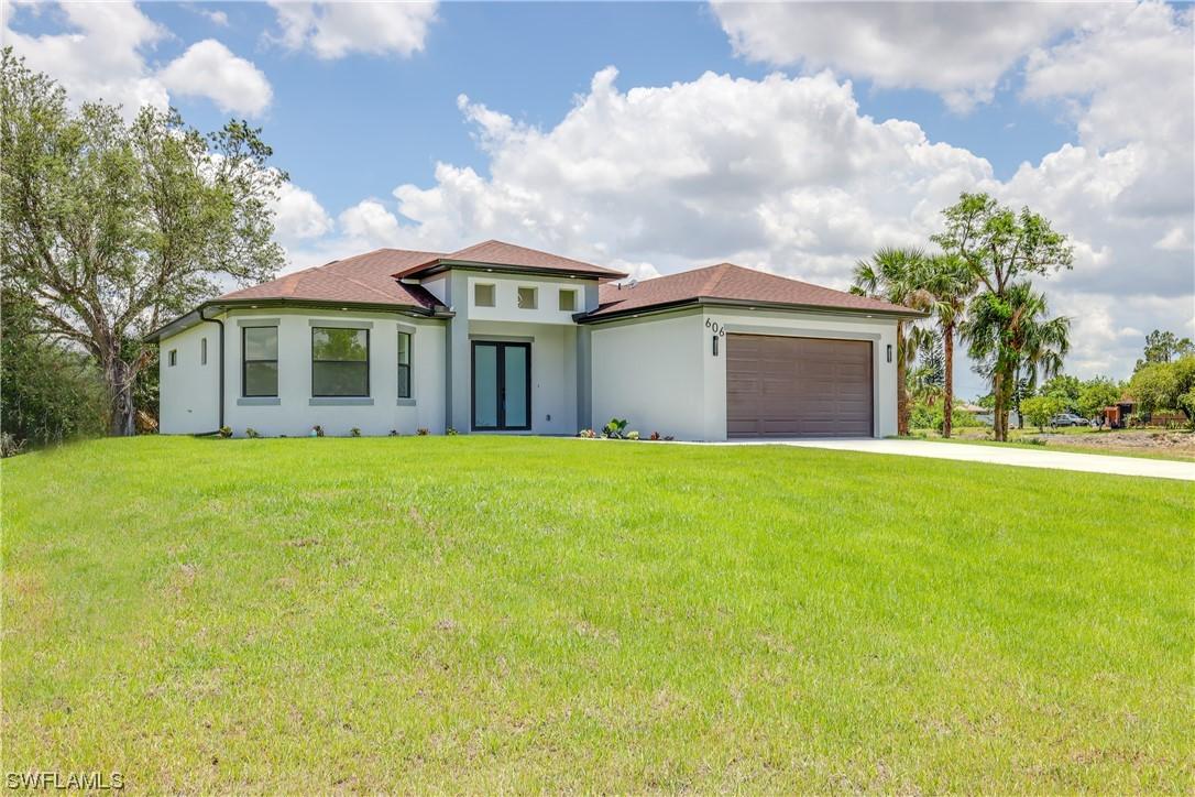 606 Harrison Dr., Lehigh Acres, FL 33936