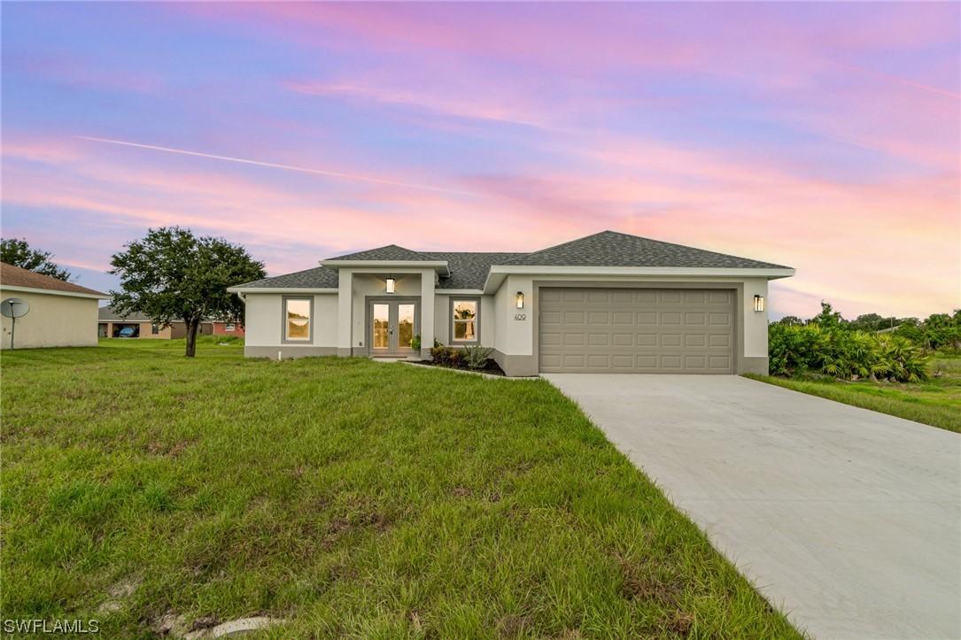409 Pickford Ave., Lehigh Acres, FL 33974