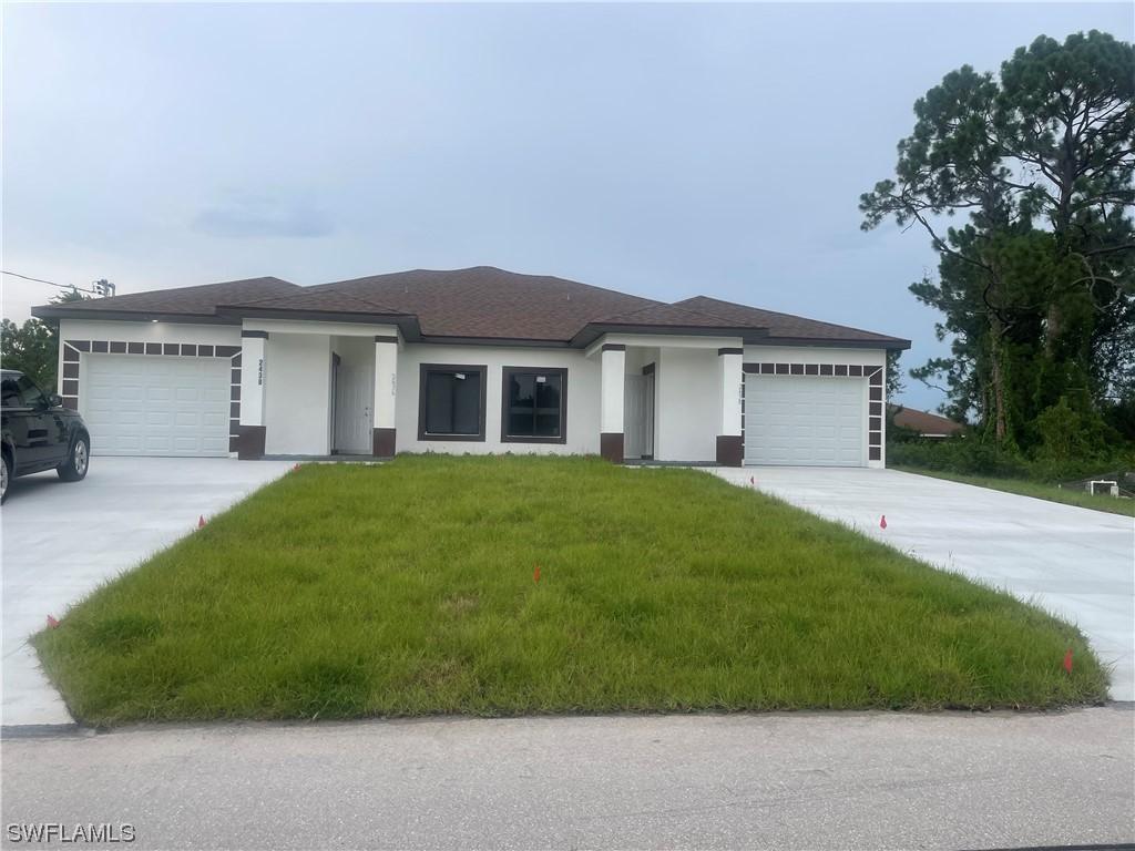 717-719 Harry Ave., Lehigh Acres, FL 33973