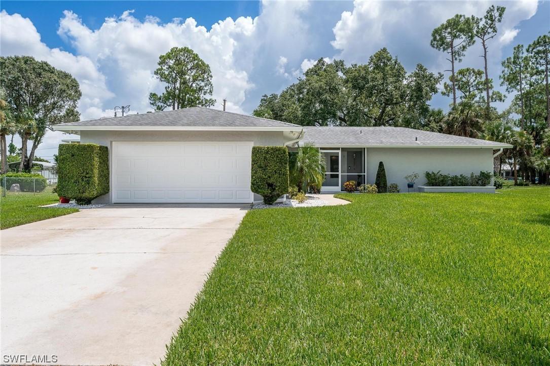 214 Lake Ave., Lehigh Acres, FL 33936