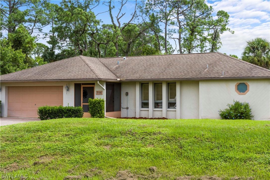 716 Mcarthur Ave., Lehigh Acres, FL 33936