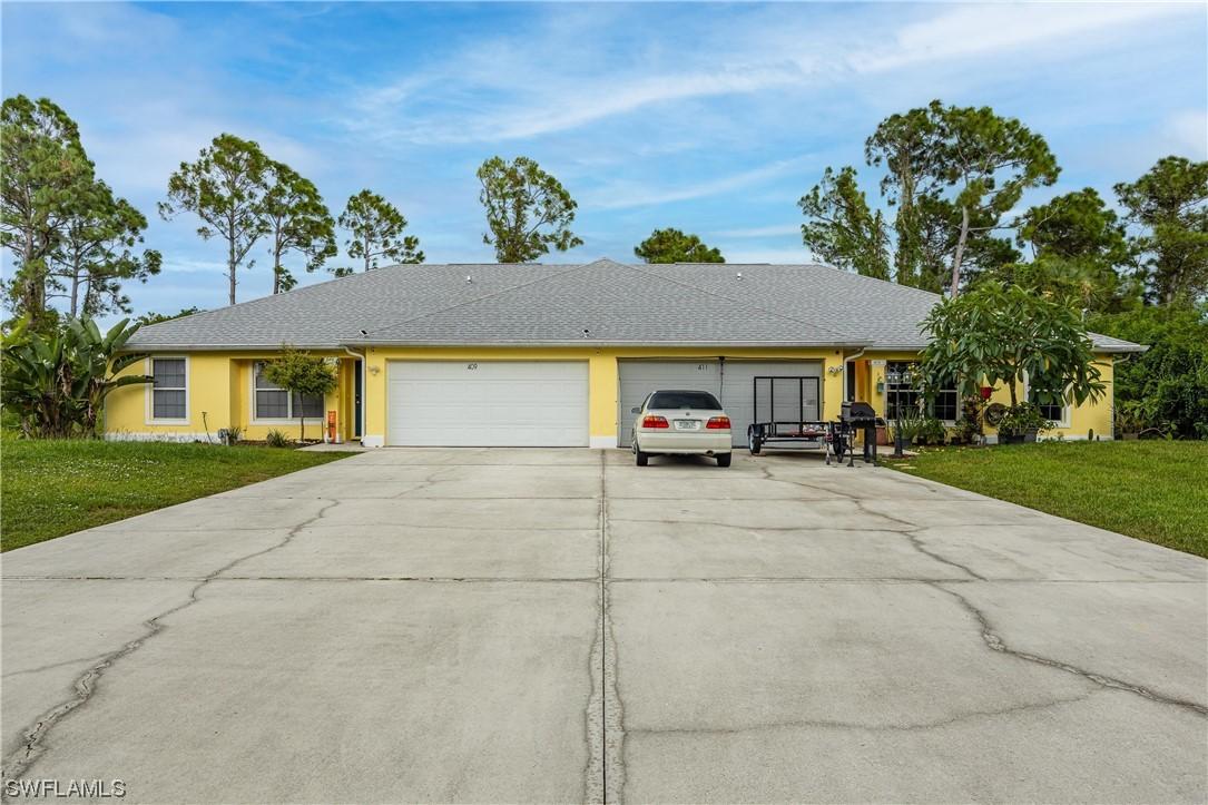 409-411 Chalet Ave., Lehigh Acres, FL 33974