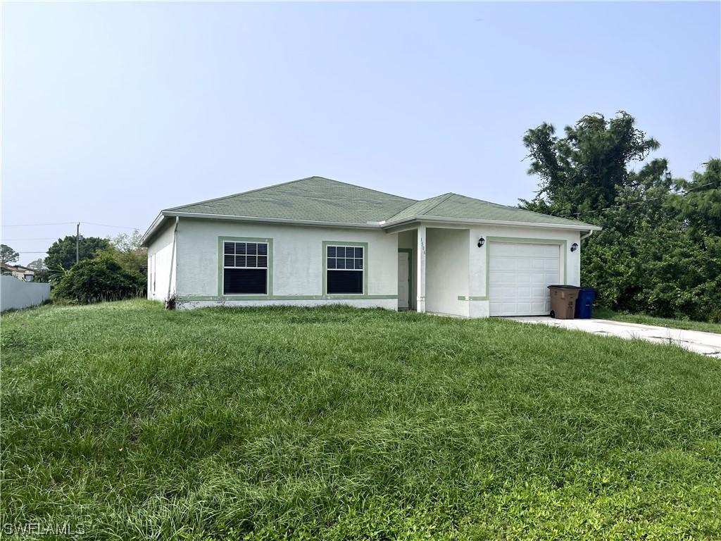 1506 Paula Ave., Lehigh Acres, FL 33976