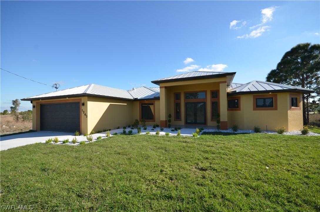 1242 Hathor St., Lehigh Acres, FL 33974