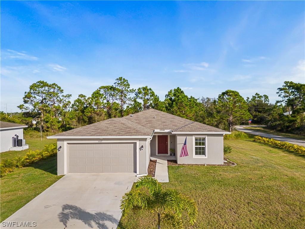 1027 Alcan St., Lehigh Acres, FL 33974
