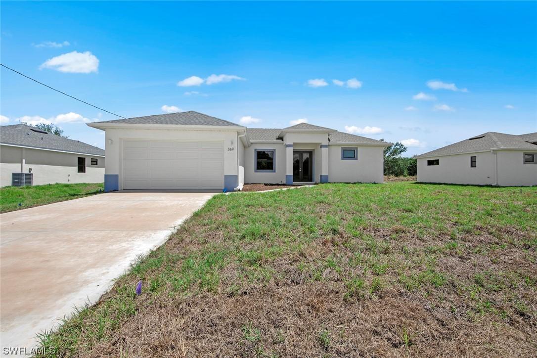 343 Rawlings Ave., Lehigh Acres, FL 33974