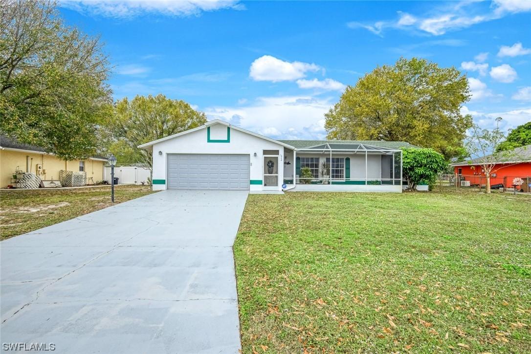 1648 Cheshire Cir., Lehigh Acres, FL 33936
