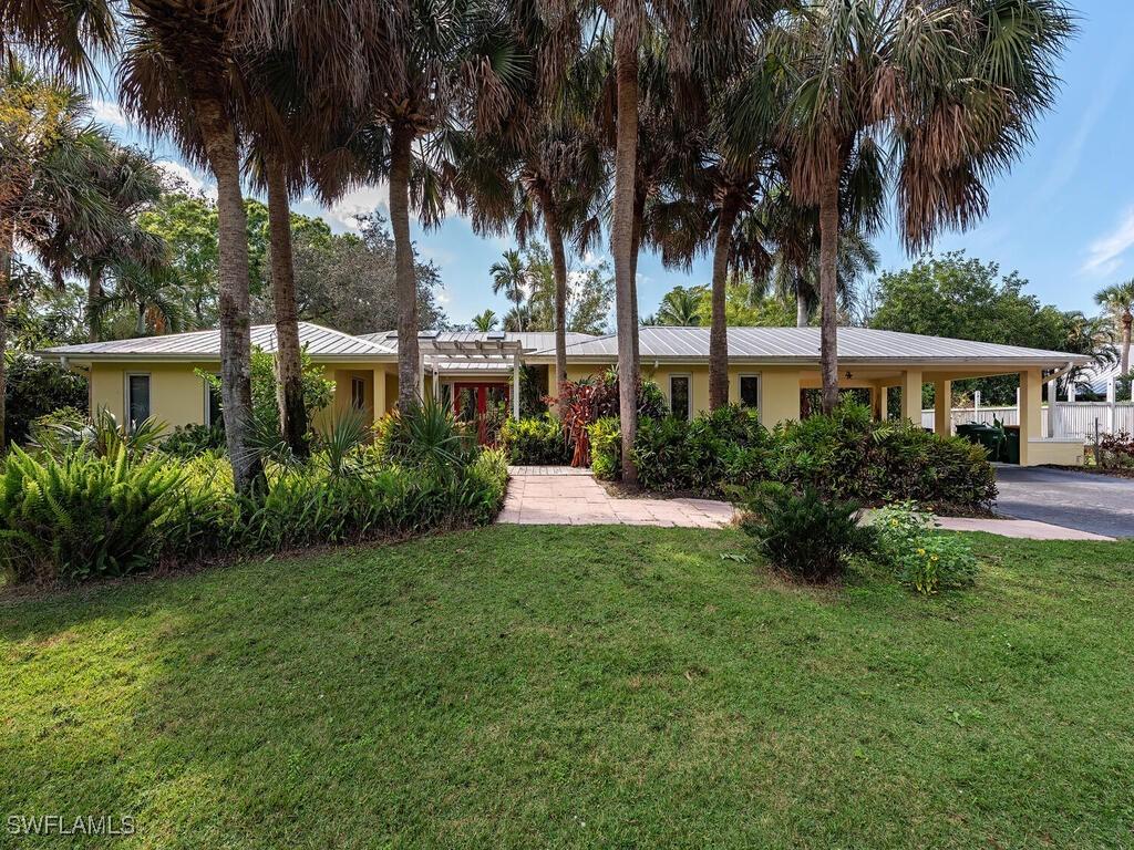 461 Carica Rd., Naples, FL 34108
