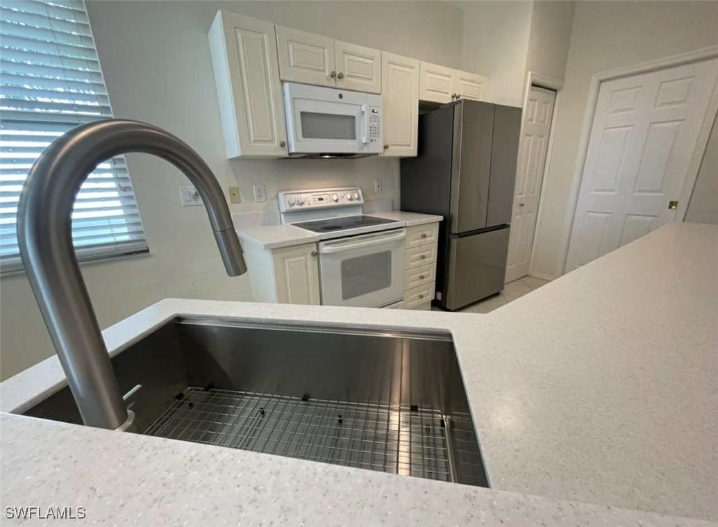 4690 Hawks Nest Way #E-204, Naples, FL 34114