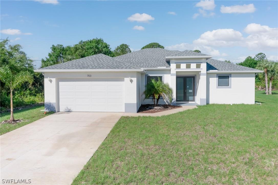 703 Washington Ave., Lehigh Acres, FL 33972