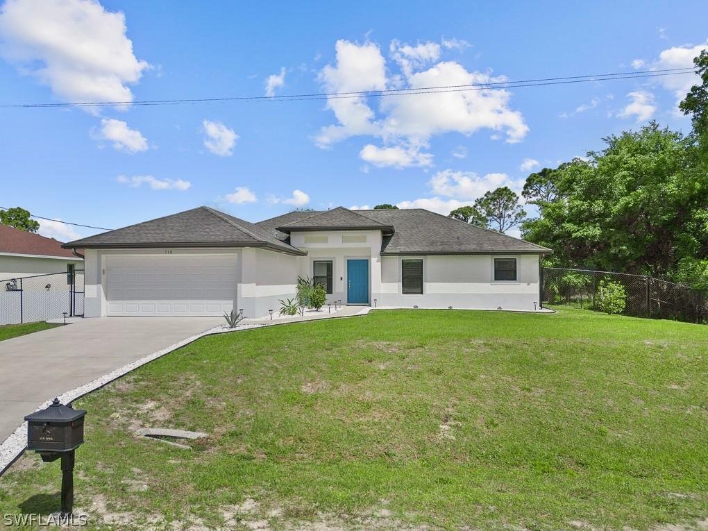 718 Plumosa Ave., Lehigh Acres, FL 33972
