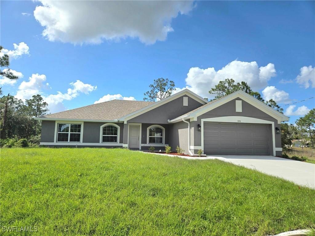 320 Malaga Ave., Lehigh Acres, FL 33974