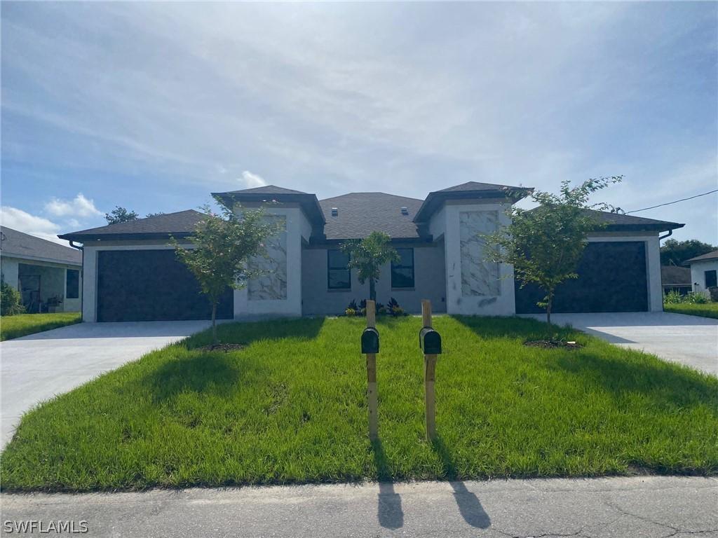 705/707 Harry Ave., Lehigh Acres, FL 33973
