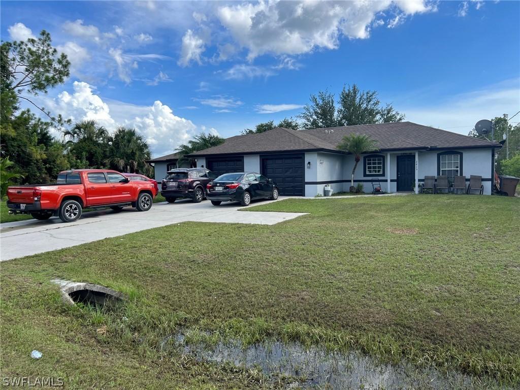 2413/2415 Churchill Ave., Lehigh Acres, FL 33971