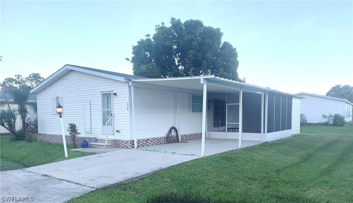 276 Grosbeak Ln., Naples, FL 34114