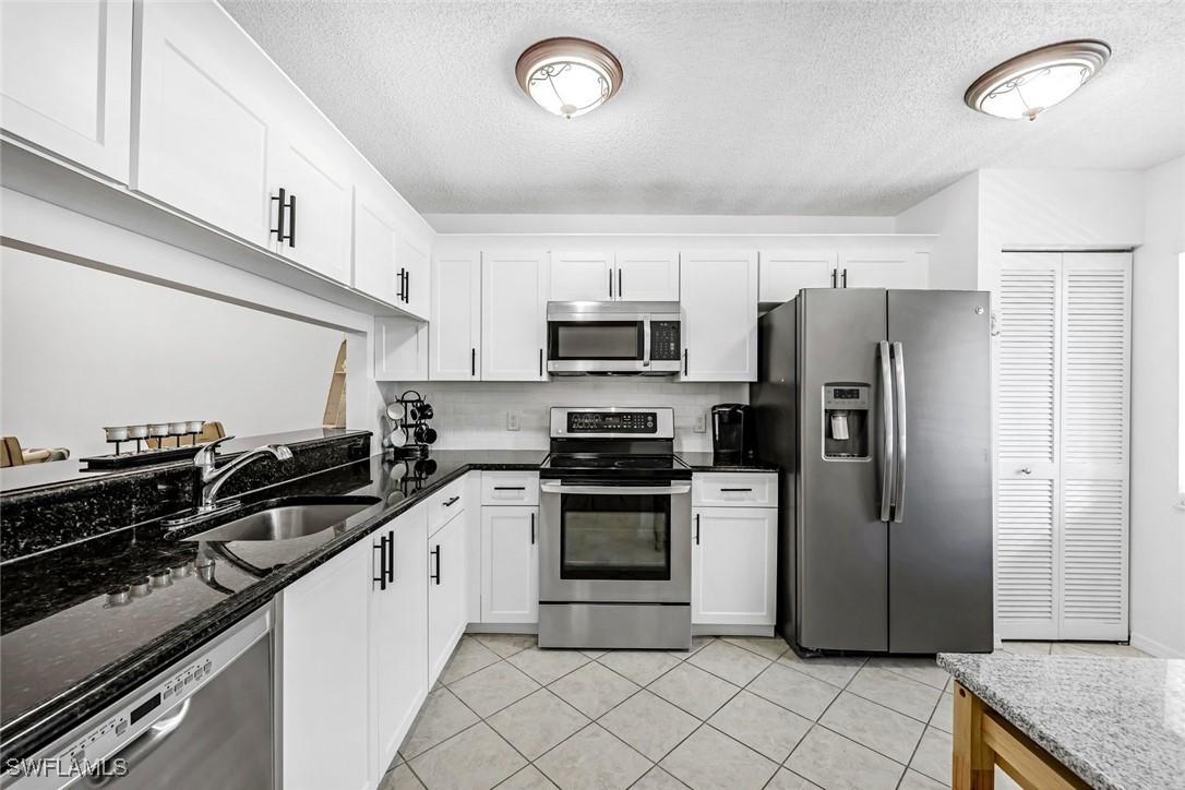 5682 Woodmere Lake Cir. #D202, Naples, FL 34112