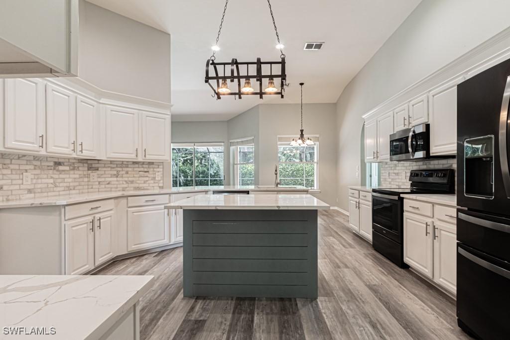 303 Burnt Pine Dr., Naples, FL 34119