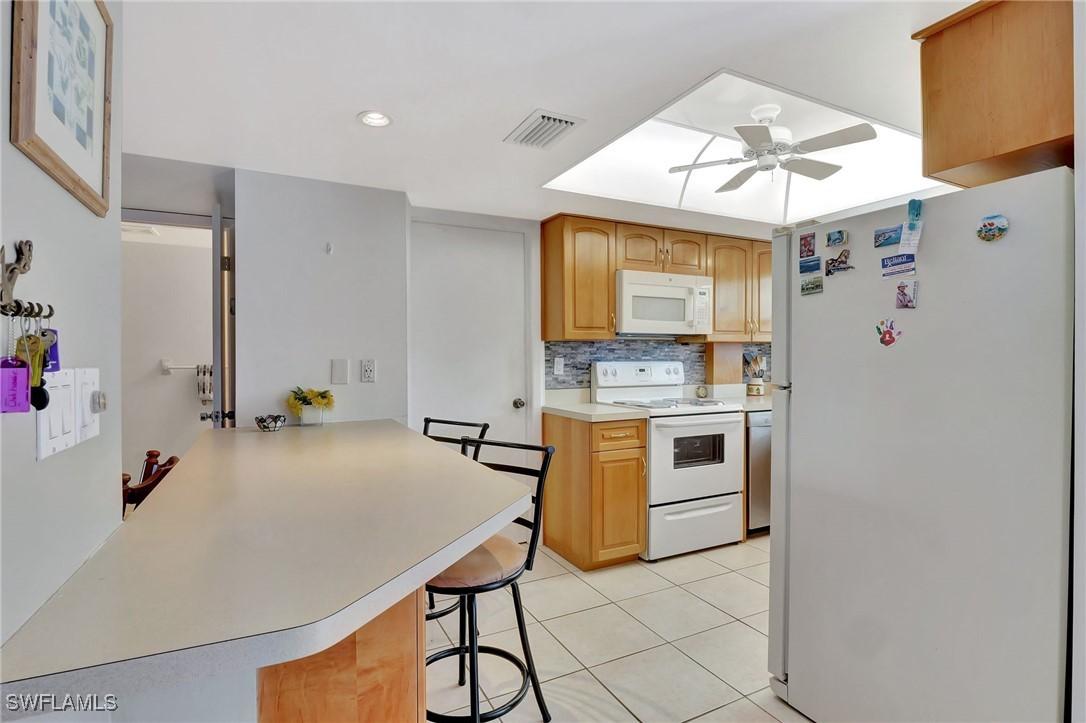 8 Watercolor Way, Naples, FL 34113