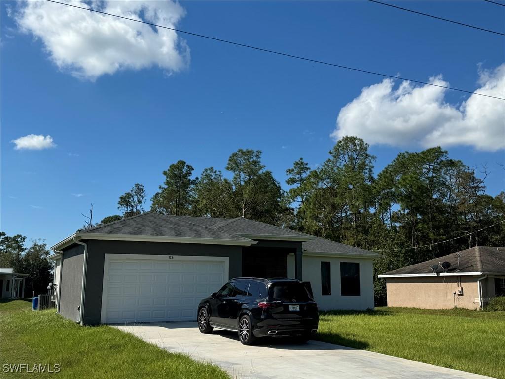 133 Greenbriar Blvd., Lehigh Acres, FL 33972