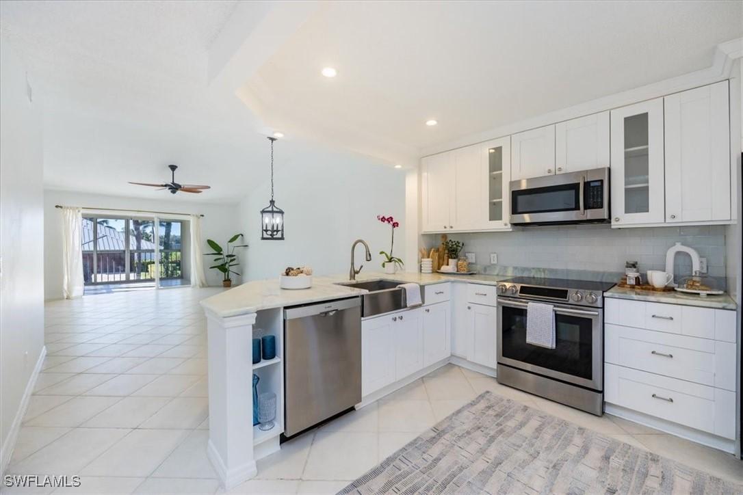 7713 Jewel Ln. #203, Naples, FL 34109