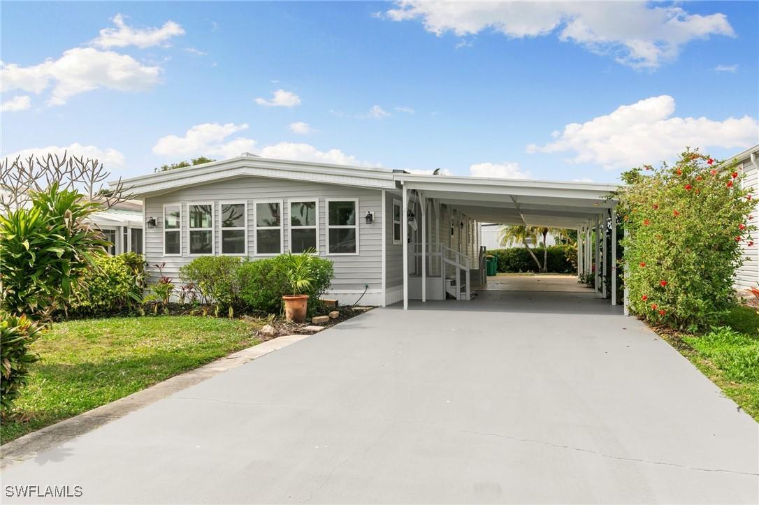 57 San Remo Cir., Naples, FL 34112