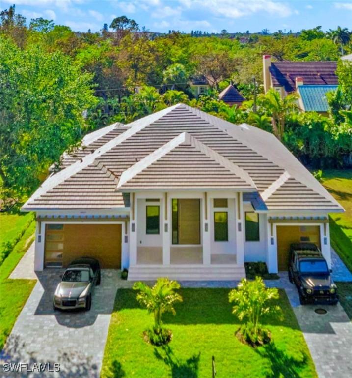 1364 Cypress Woods Dr., Naples, FL 34103