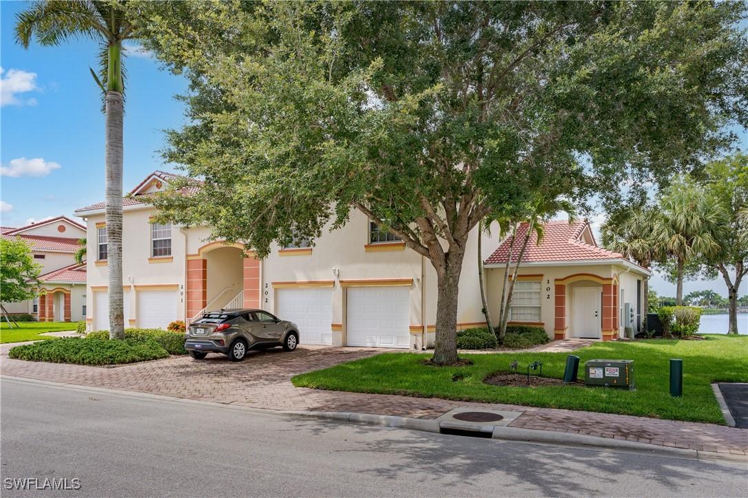 25061 Peacock Ln. #102, Naples, FL 34114