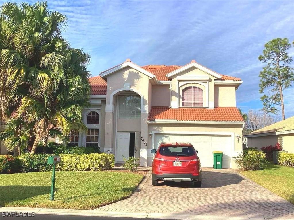 7491 Berkshire Pines Dr., Naples, FL 34104