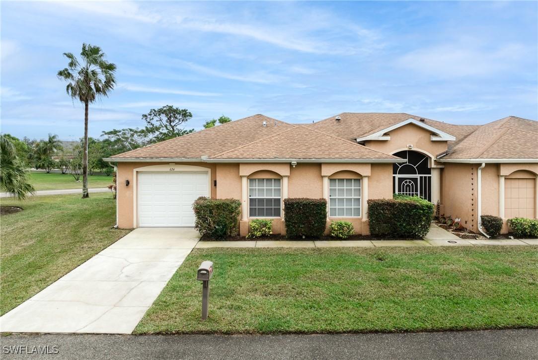 624 Falls Ln., Lehigh Acres, FL 33974