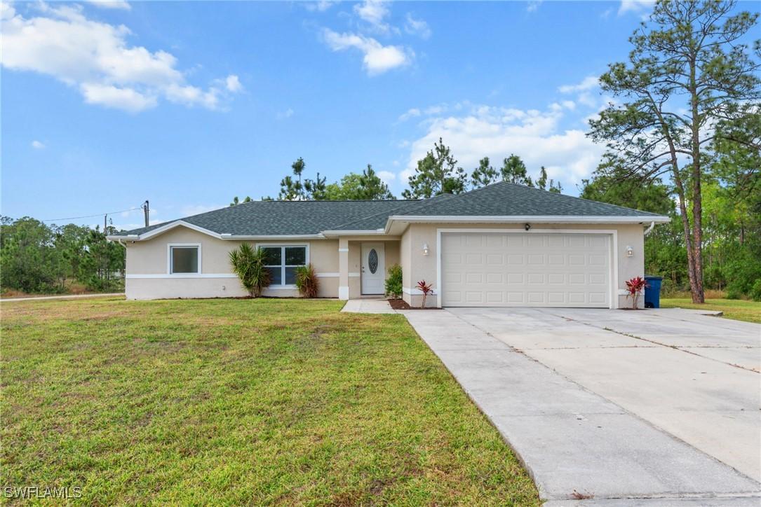 2009 Raber Ct., Lehigh Acres, FL 33972