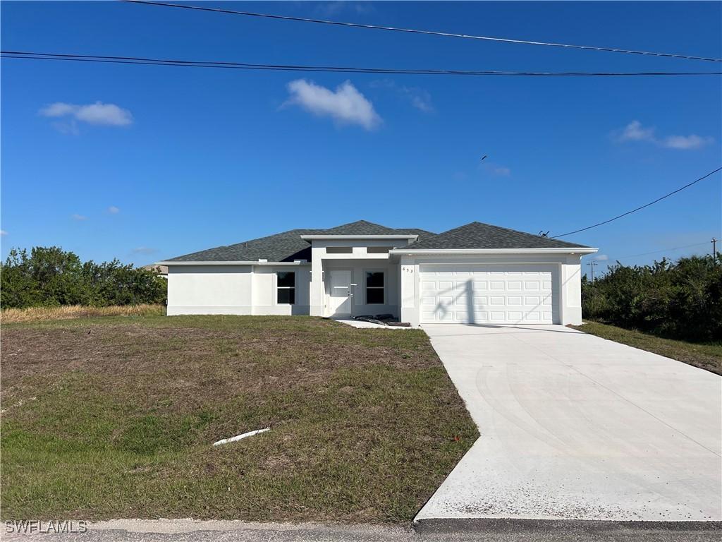 653 Theodore Vail St., Lehigh Acres, FL 33974