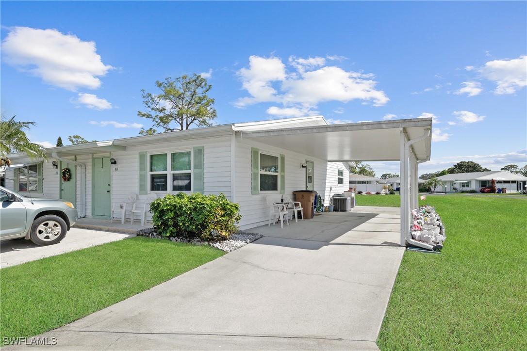30 Desert Candle Cir., Lehigh Acres, FL 33936