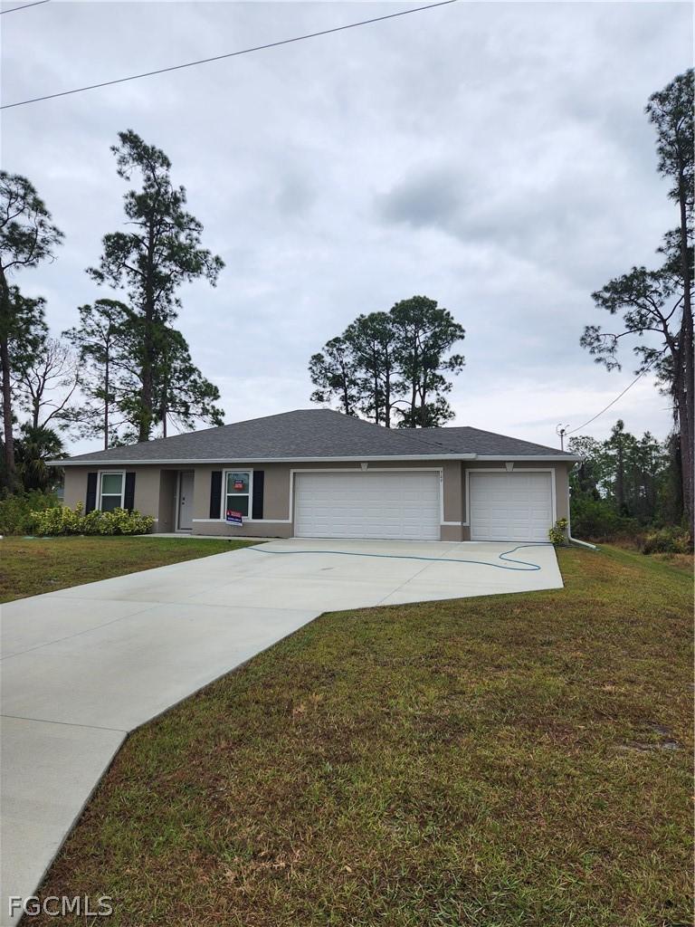 309 Hermosa Ave., Lehigh Acres, FL 33974