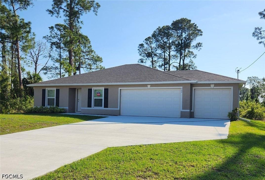 309 Hermosa Ave., Lehigh Acres, FL 33974